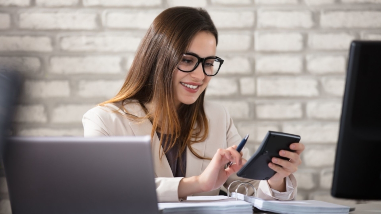 Female accountant or bookkeeper at desk