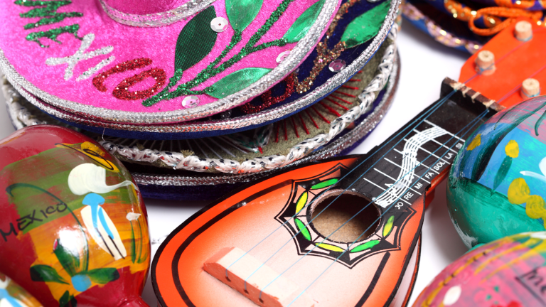 a collection of colorful hats and musical instruments
